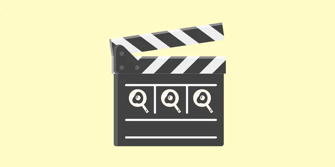 Emoji Kitchen creation of a clapperboard and a frying pan