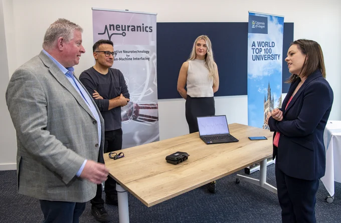 From left: Noel McKenna, CEO of Neuranics; Professor Hadi Heidari, CTO of Neuranics; Rhianna Sweeney; Applications Engineer at Neuranics and Kate Forbes MSP, Deputy First Minister. Neuranics are pictured giving a demonstration of their wearable technology.