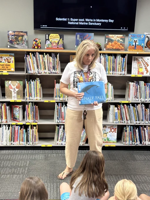 Cindy Holguin, the librarian at Frontier Valley Elementary, is introducing the OBOD book Whale Fall to her students, by showing them a video of a whale fall and preparing them for the virtual author visit in November.