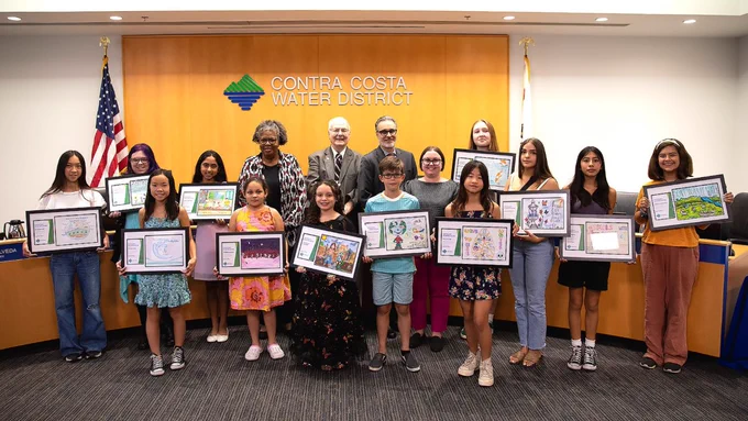 CCWD's Board of Directors presents awards to this year's winners of the Water Awareness Youth Art Contest.