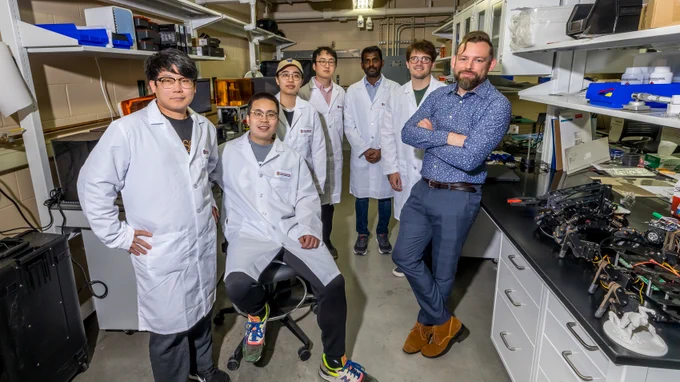 Associate Professor James Pikul and members of his research lab