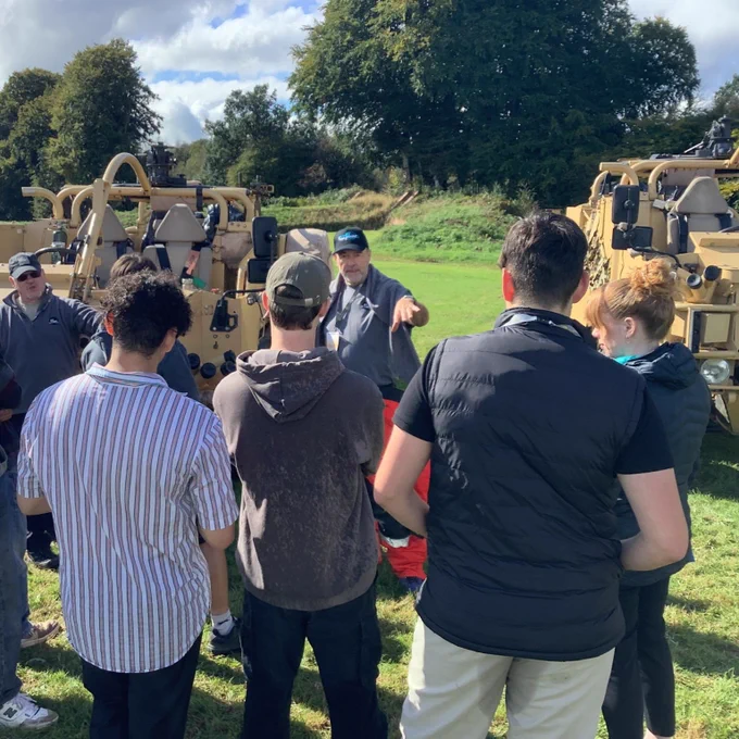 Students are given a tour of the transporters