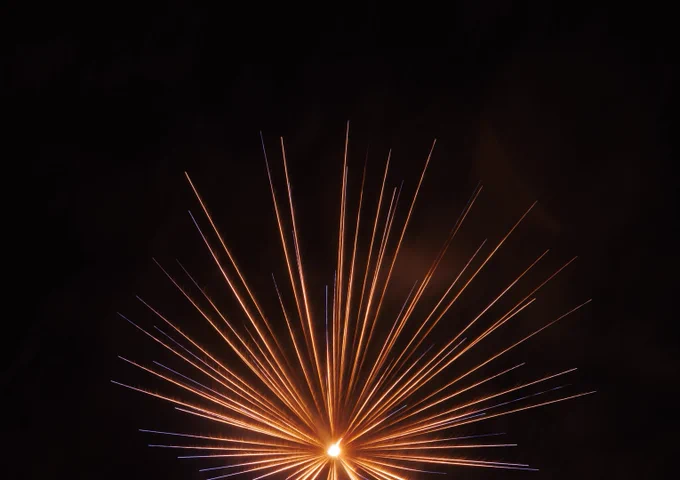 Orange firework in the sky 