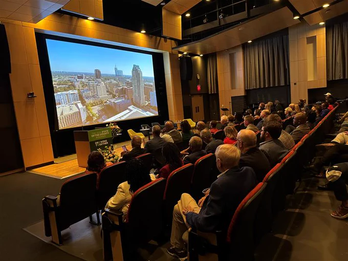 People sitting listening to the 2024 State of the County Address