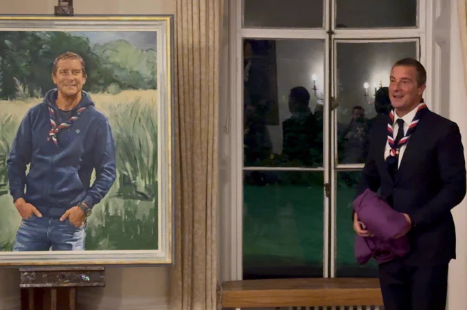 Bear Grylls, 10th Chief Scout of The Scout Association, unveiling a portrait of himself.