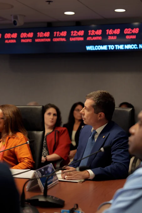 Secretary Pete Buttigieg in a conference room in a meeting at FEMA HQ.