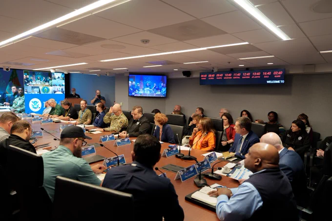Secretary Pete Buttigieg in a conference room in a meeting at FEMA HQ.