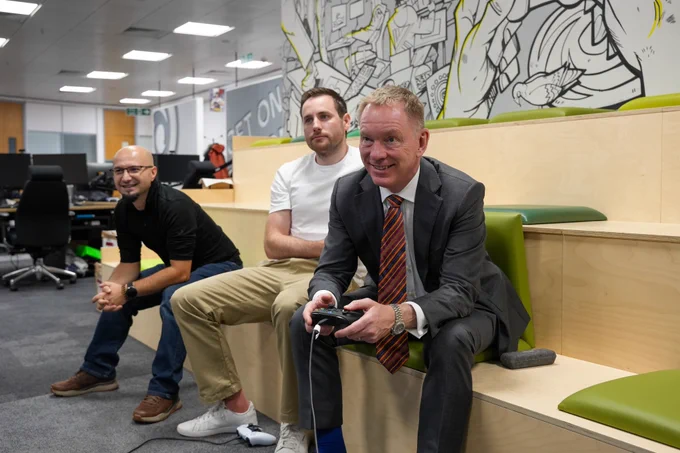 Minister Bryant at Ubisoft with staff members