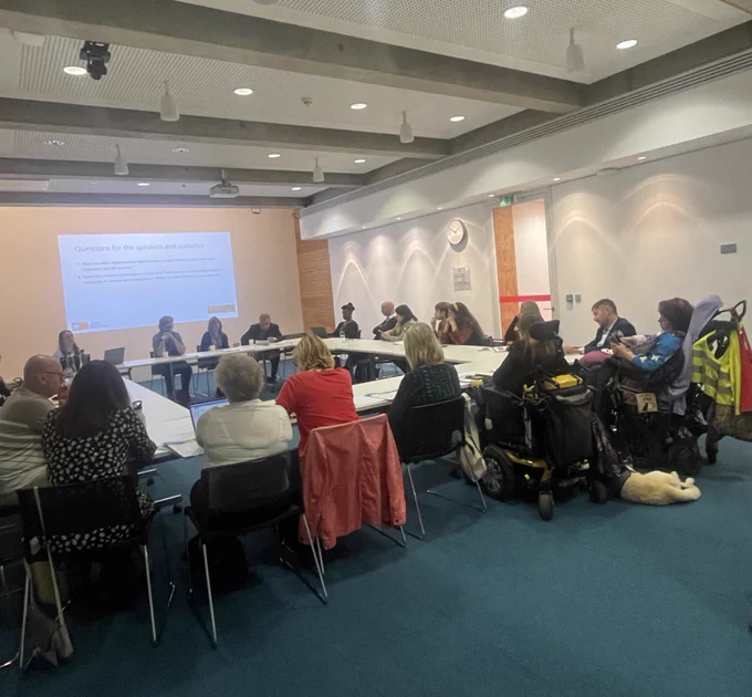 Photo of event attendees at a breakout session