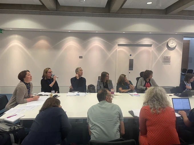 Photo of breakout session participants taking part in the conversation