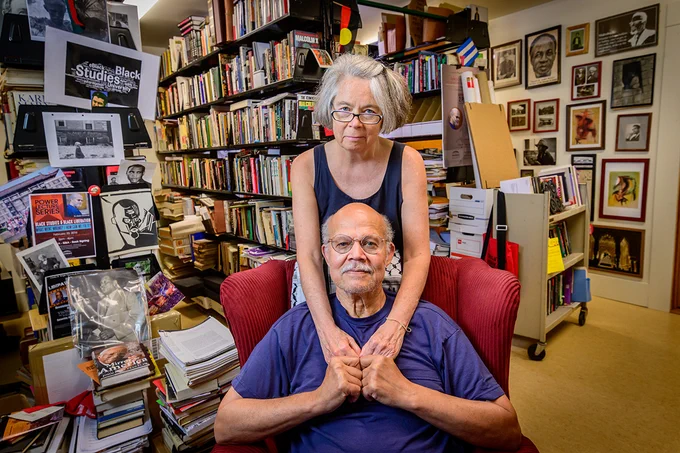 Gerald McWorter is pictured in his home library with his wife Kate Williams-McWorter, a professor emerita of information sciences.

Photo by Fred Zwicky
