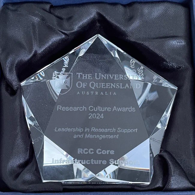 The UQ Research Culture Award 2024 trophy for "Leadership in Research Support & Management."