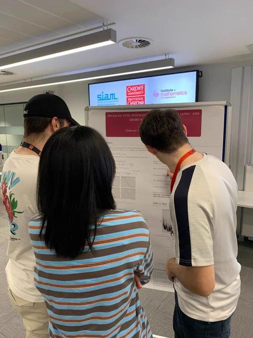 PGR students and staff attending the poster session