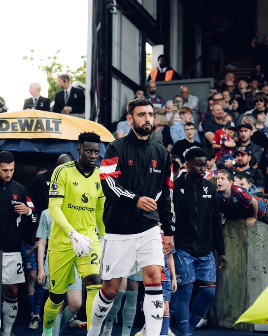Bruno Fernandes leads United out at Selhurst Park.