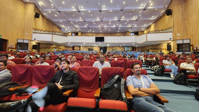 Attendees listening to James Powell