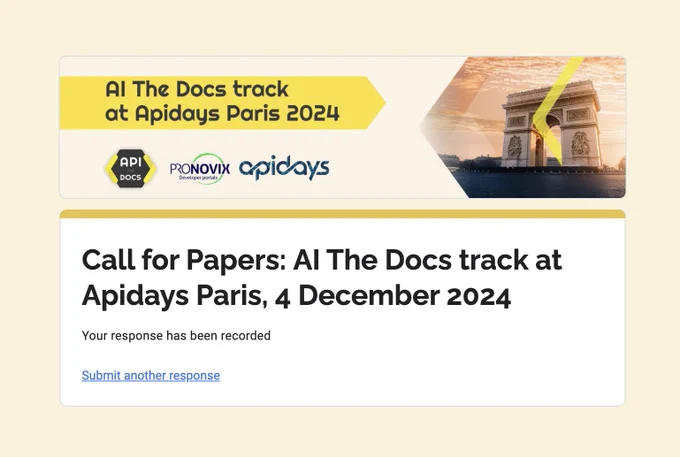 A screenshot of the 'Call for Papers' submission confirmation for the AI The Docs track at Apidays Paris 2024, scheduled for December 4, 2024. The banner at the top features the event name, 'AI The Docs track at Apidays Paris 2024,' alongside logos for API The Docs, Pronovix, and Apidays. The banner includes a photo of the Arc de Triomphe in Paris. Below the banner, the text confirms the user's response has been recorded for the Call for Papers submission. There is also a link labeled 'Submit another response.'