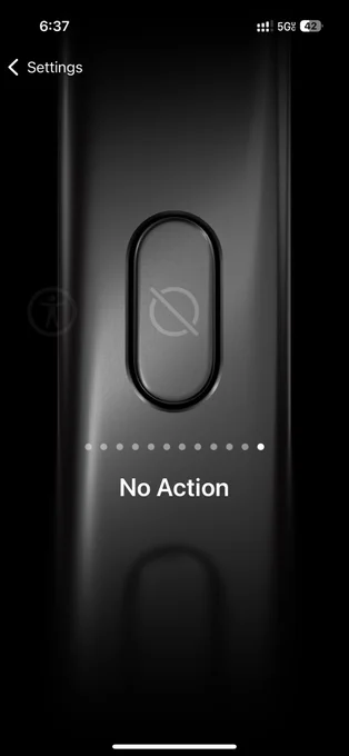A screenshot of the iPhone 15 Pro  Action button action selection menu set to "No Action"