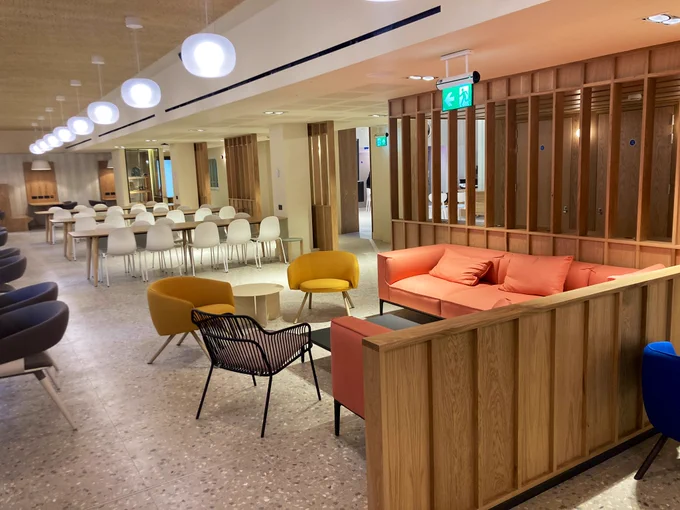 Colourful seating at the Pumphandle Social’s canteen. Wooden partitions and modern lighting can also be seen in this expansive, bright area.