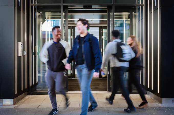 Students talking and walking