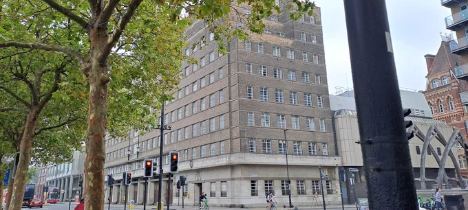 View of the exterior of Lambeth Fire Station, looking at the side with the Memorial Hall room on the ground floor. The building is the former London Fire Brigade headquarters built in 1937. This image was taken in September 2024. 