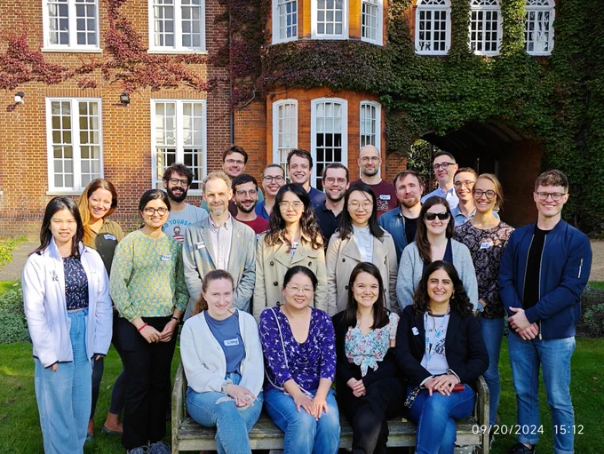 The members of our Efficient Study Design theme - all looking at camera and smiling with building in the distance. 