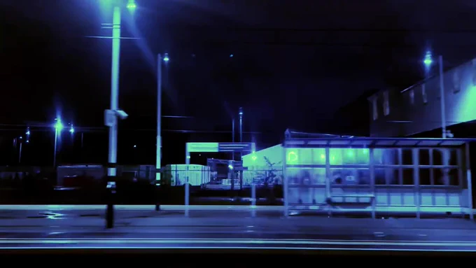 colour video still showing railway station at night