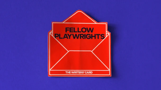 A red paper envelope that says "The Writers' Card on it. Inside is a note on red note paper that reads "Fellow Playwrights". It's on a dark blue background.