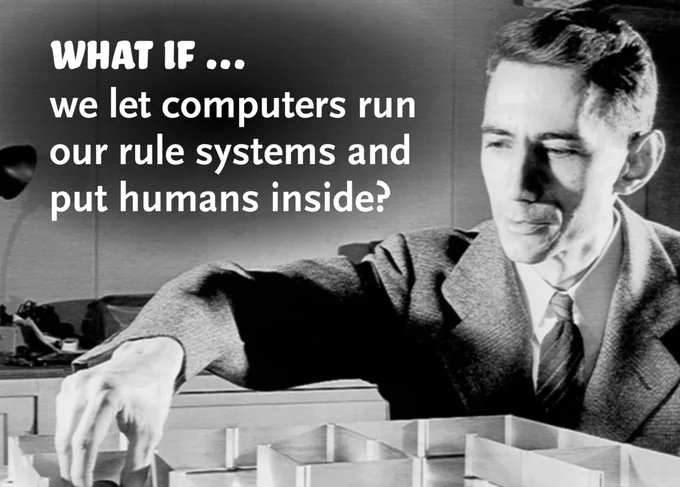 Claude Shannon putting an electric mouse into a metal maze, with the inscription "What if ... we let computers run our rule systems and put humans inside?"
