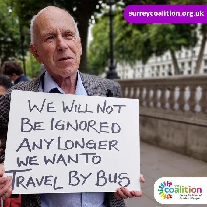 Coalition member Jonathan, at a campaigns trip in London, telling the government about the safety problems of floating bus stops. Jonathan is holding a sign with the words 'We will not be ignored any longer we want to travel by bus'.