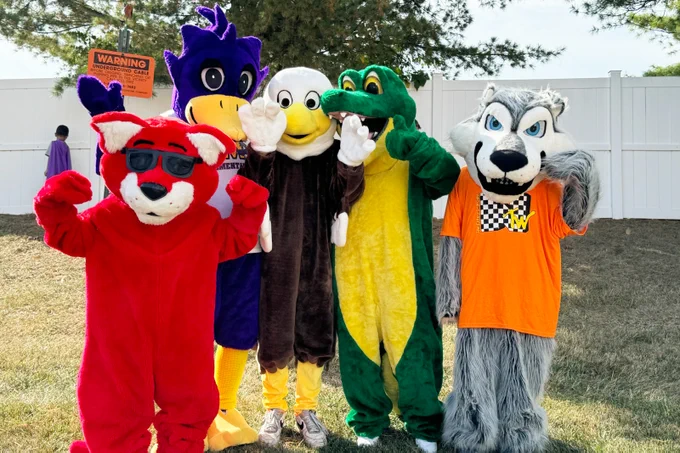Five Rockwood mascots pose together at the Celebrate Wildwood parade.