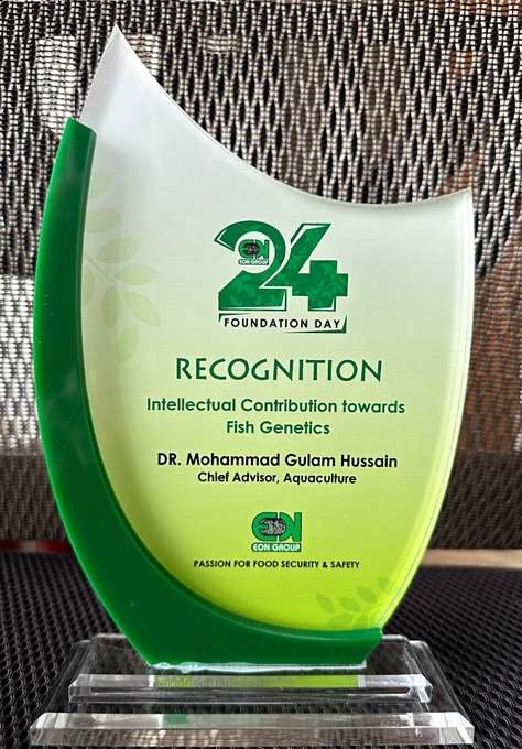 a picture of Dr. M. Gulam Hussain's award recognizing his intellectual contributions to fish genetics