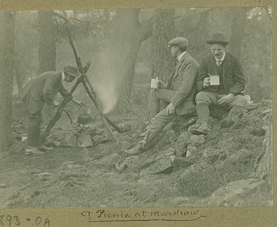 'A picnic at Marshaw' by Sam Thompson, [1893]. A sepia photograph of a campfire. Lancashire Archives and Local History collections.
