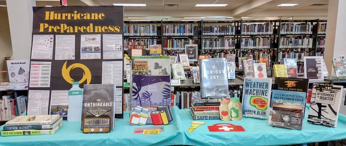 PHSCLibraries, PHSCSpringHillCampus library, hurricane preparedness display, display with books about meterology, display with information about hurricanes, book display