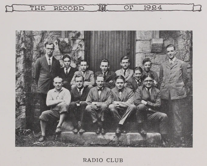 Black and white photo in The Record of 1924 (Haverford's yearbook) of 13 young men sitting on steps in a group, with the caption "Radio Club"