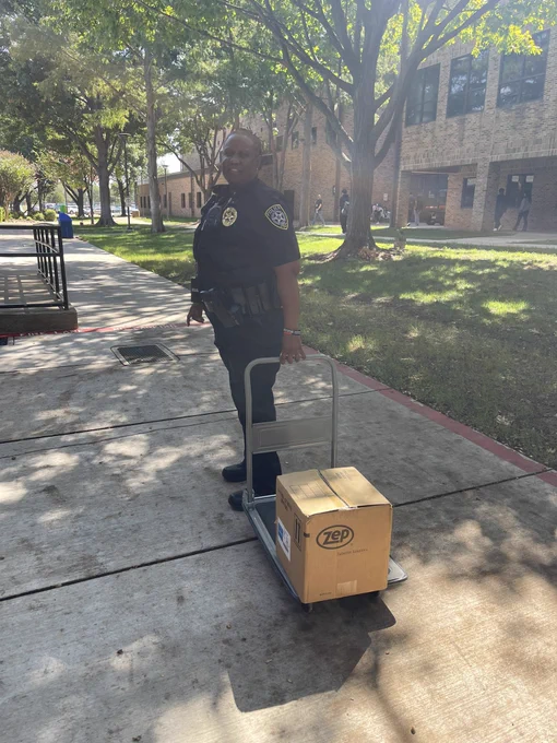 Lt. Gregg dropping off hand sanitizer at the police office at Brookhaven Campus..