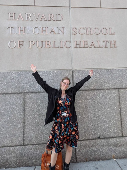 Jessica in front of the building of the Harvard T.H. Chan School of Public Health.
