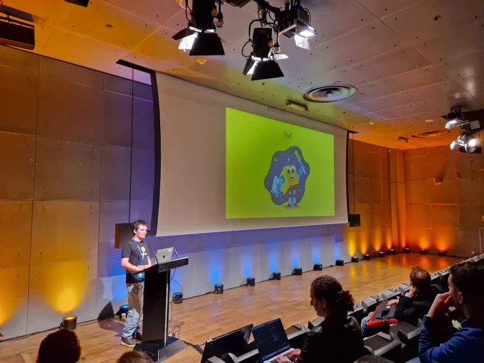 Nichita Morcotilo on stage at PyData Paris.