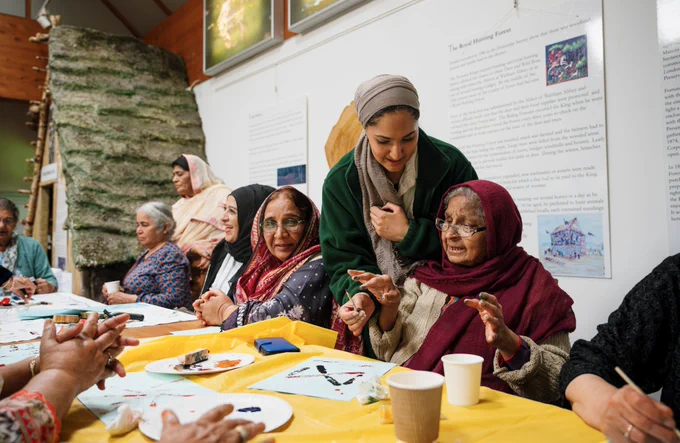 People working together at craft table
