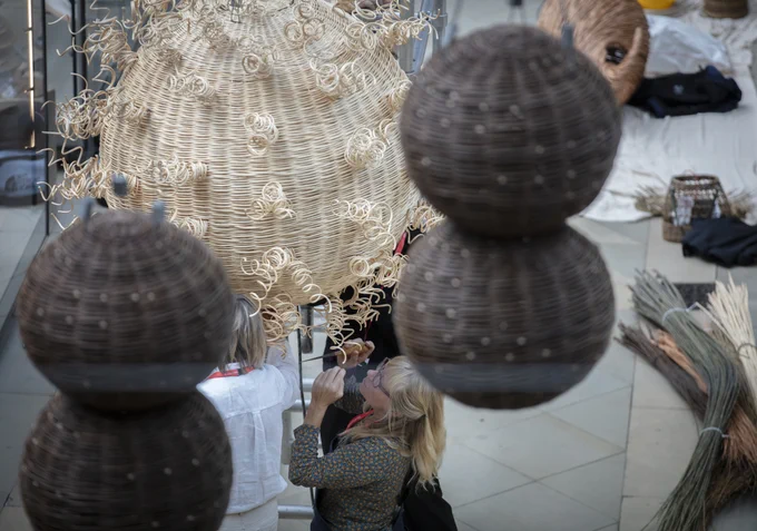 Woven sculputres of the bacteria that causes pneumonia and covid-19 
