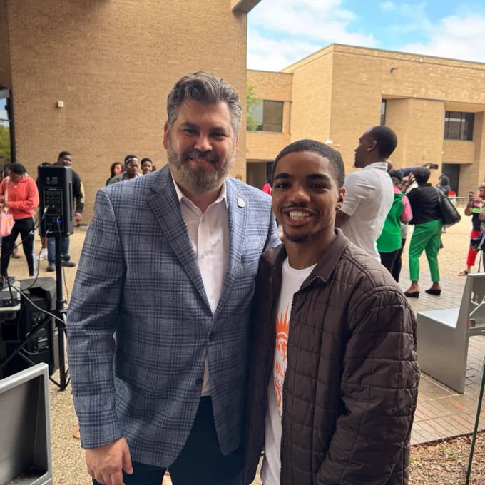 I'm standing alongside Boston, a Cedar Valley student.