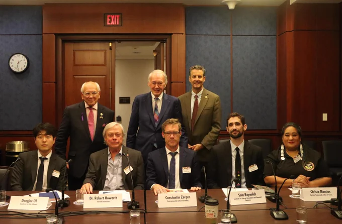 Senator Markey poses with Representative Tonko and global climate leaders.