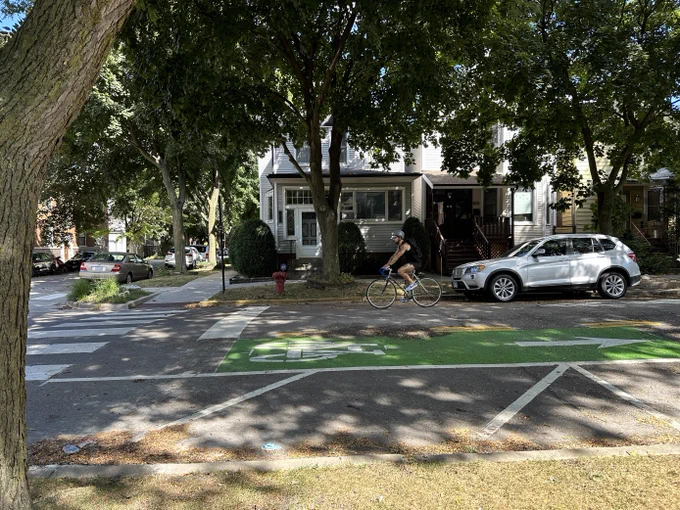 A person riding a bike on the Berwyn greenway
