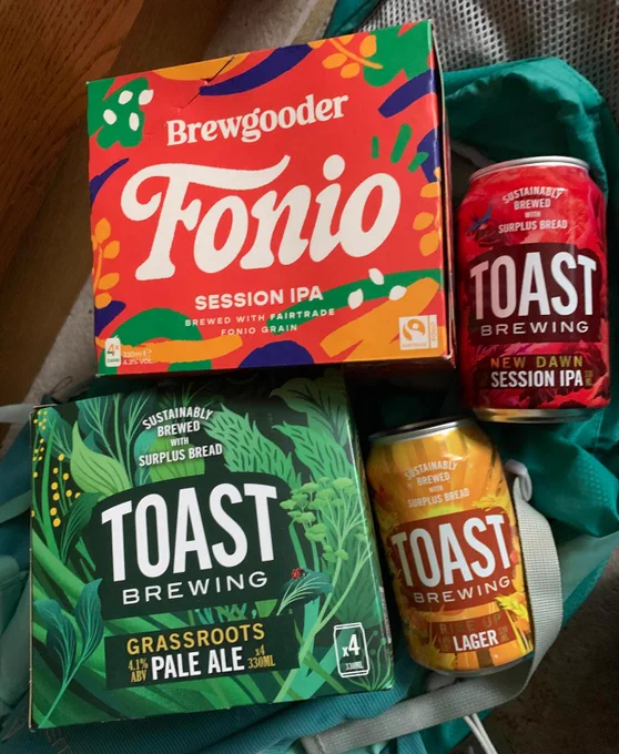 Image of box of Brewgooder Fairtrade IPA and variety of Toat ales.