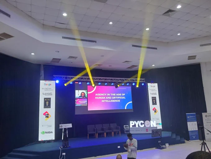 Marlene on stage at PyCon Africa 2024 Delivering a Keynote titled "Agency in the Age of Human and Artificial Intelligence"