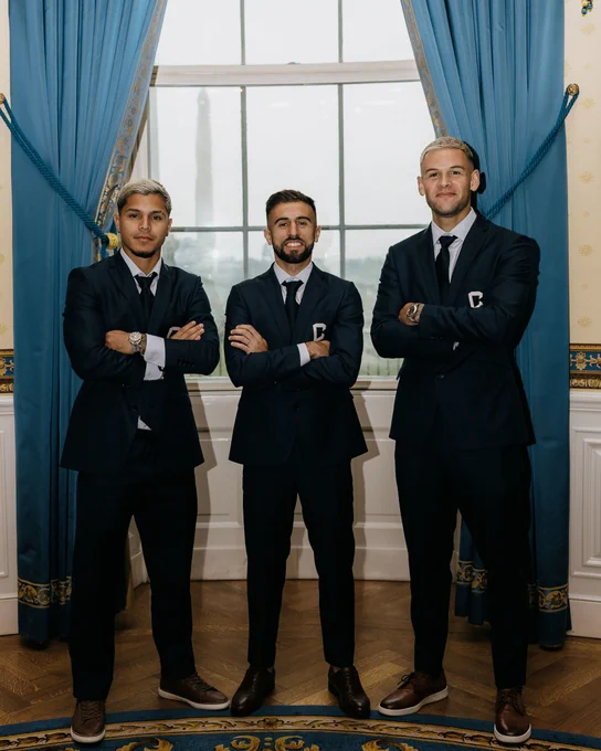 Image of Cucho, Rossi and Ramirez in the White House. 