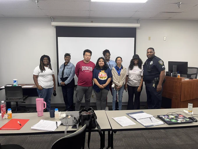 Cpl. Norwood standing with the CPA class.