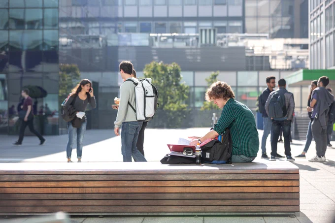 Students chatting and studying on Imperial's South Kensington campus.