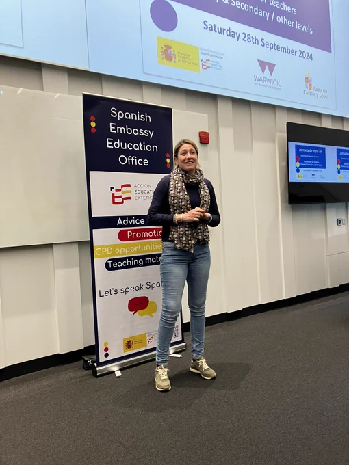A woman speaking in a lecture theatre