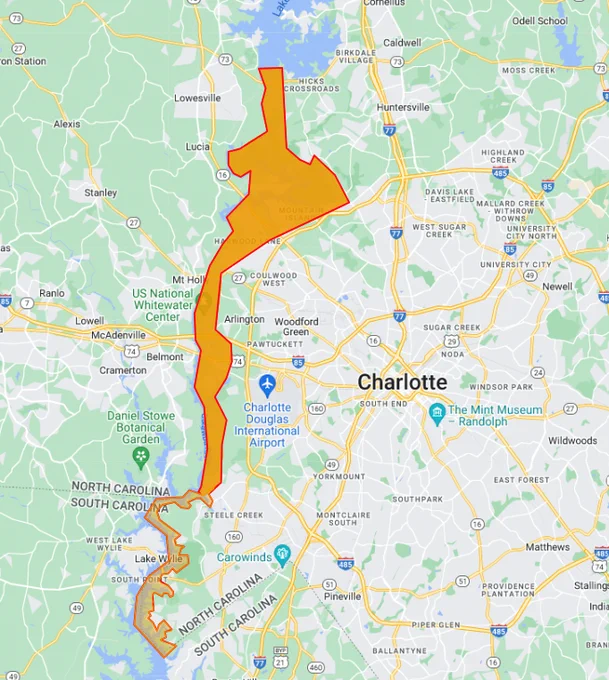 A map of Mecklenburg County with a highlighted area stretching from north to south along the Western Edge of Mecklenburg County along Lake Norman, Mountain Island Lake, the Catawba River, and Lake Wylie. 