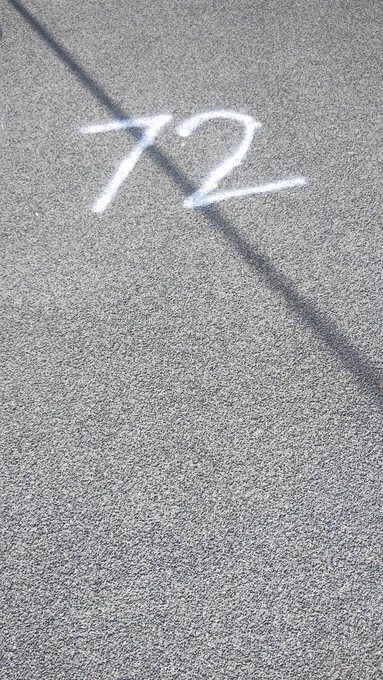 Street art that says 72 referring to the number of men currently known to be playing in the female football leagues.